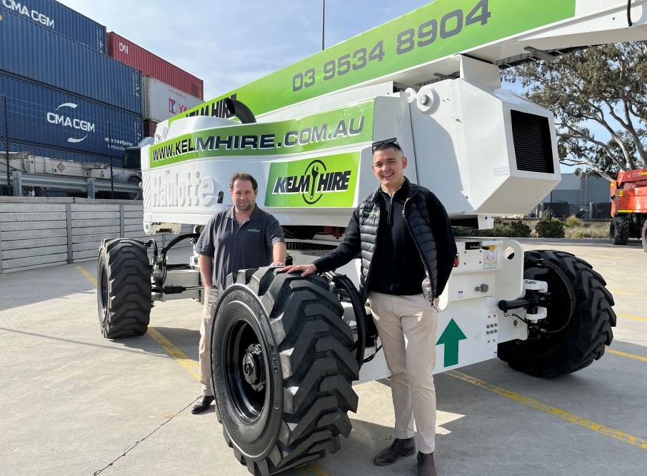 men standing in front of machine